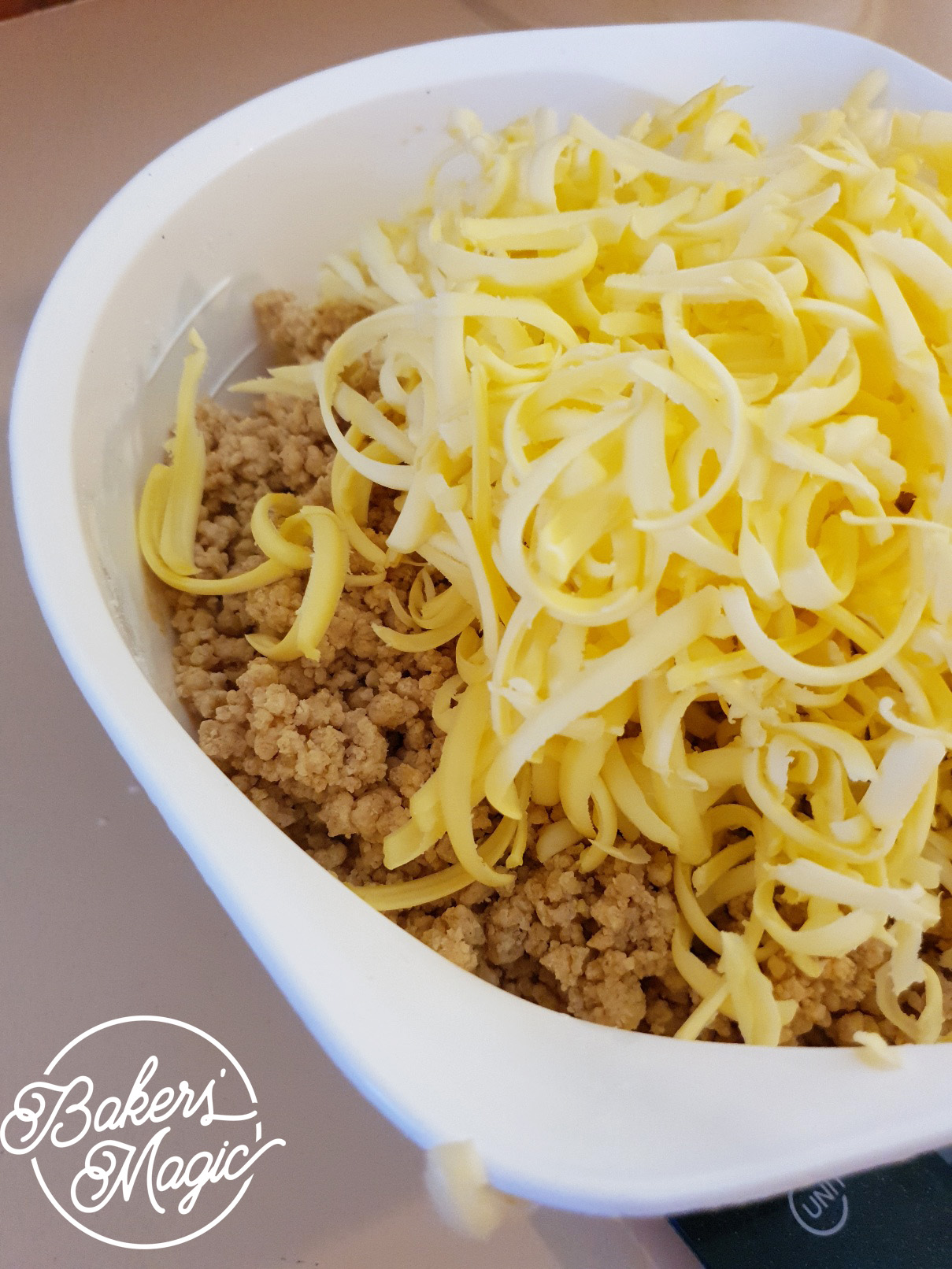 Dough broken up in a food processor & grated butter added.