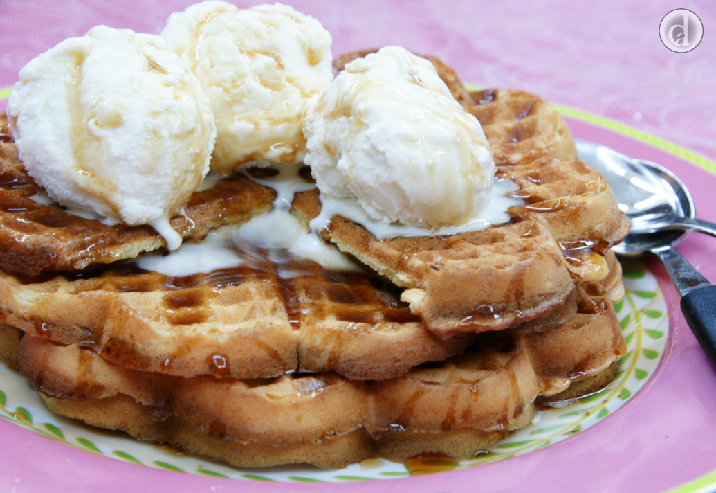 Waffles topped with maple syrup & icecream