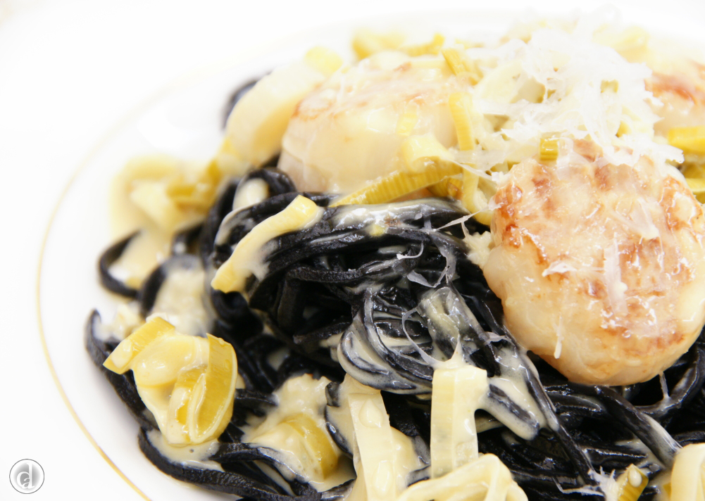 With scallops, baby leek, white wine and cream